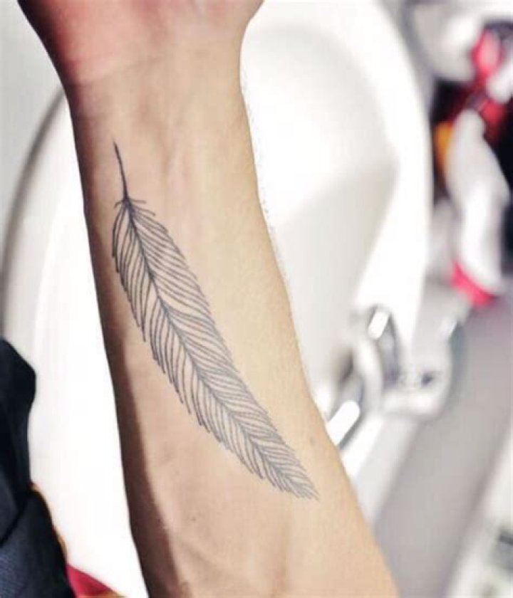 Liam Payne's Feather Tattoo: A Symbol of Freedom and Transformation